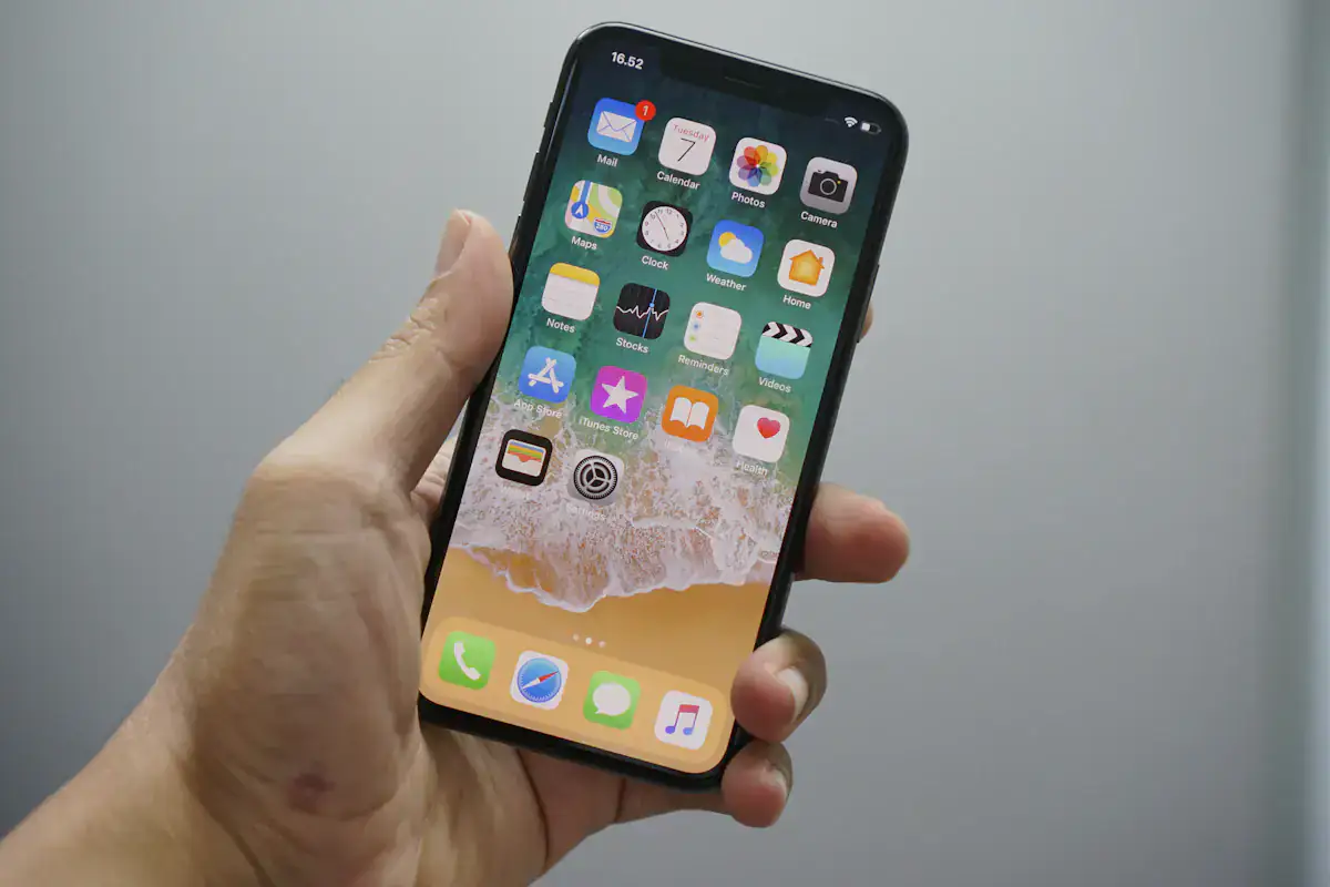Smartphone displaying app icons; illustrative mobile technology photograph